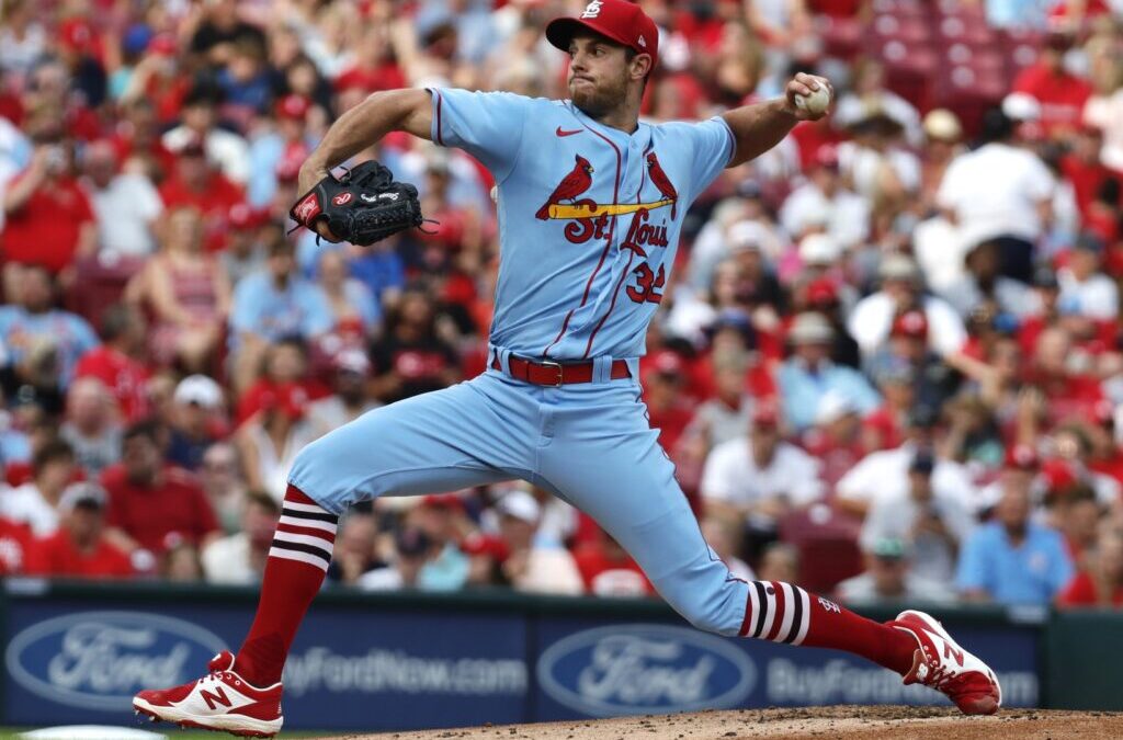 April 8, 2023: St. Louis Cardinals center fielder Tyler O'Neill (27) hits a  ball in play during the game between the Milwaukee Brewers and the St.  Louis Cardinals at American Family Field